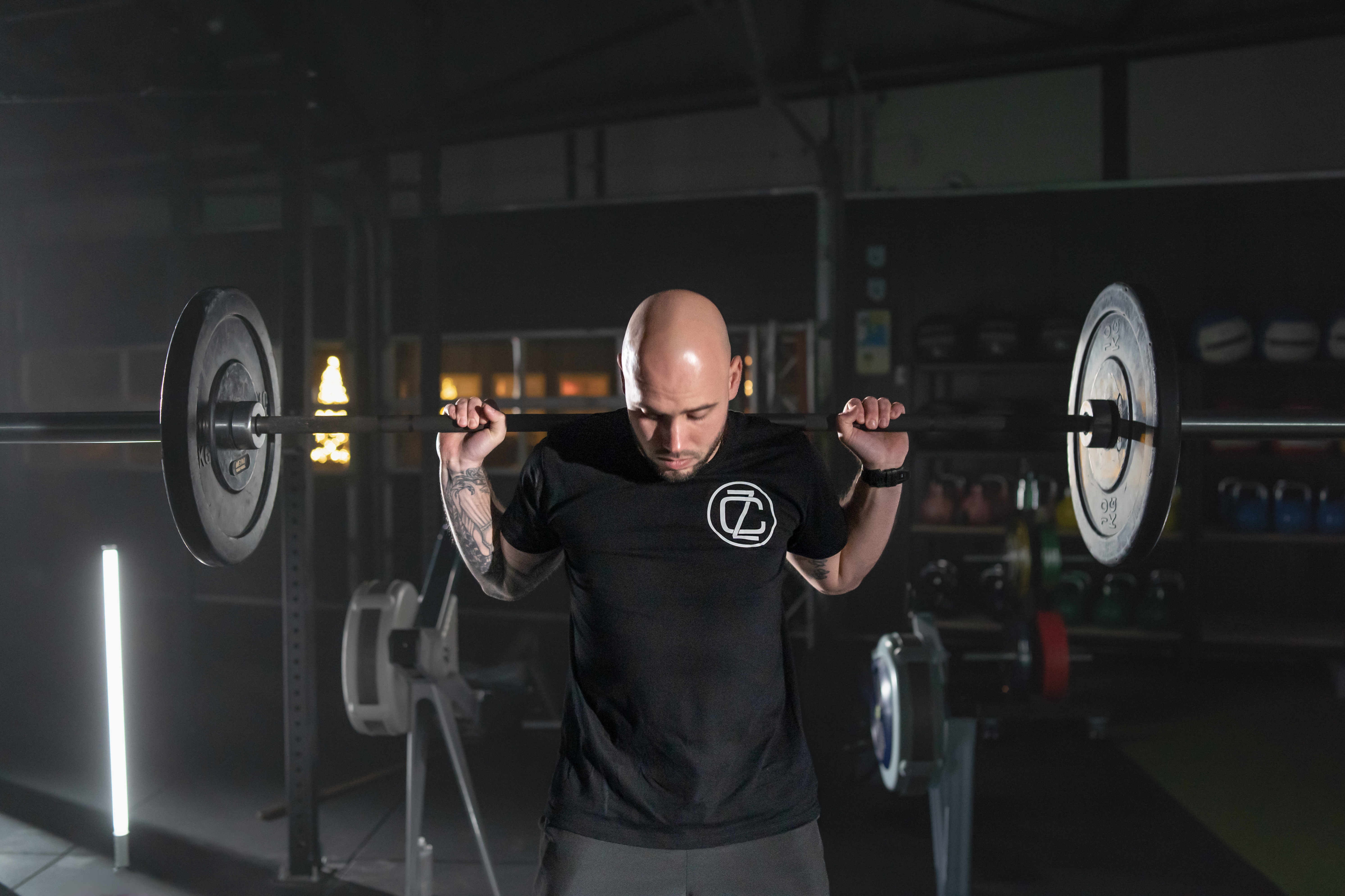 Epic weightlifting moment as the athlete conquers the barbell, showcasing strength, determination, and precision in each lift.